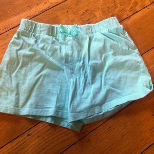 Place girls light green size 10/12 shorts